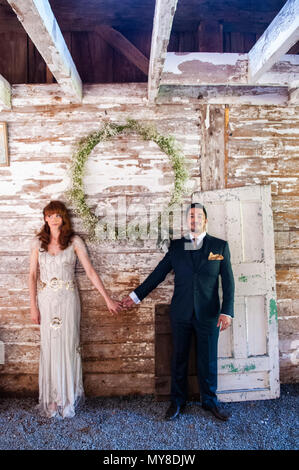 Millennial couple's barn wedding Stock Photo