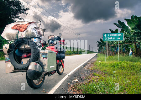 Touring motorcycle on roadside, Panama City, Panama Stock Photo