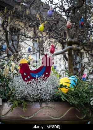 Easter decorations (chicken and eggs) in a countryside garden (Germany). Stock Photo