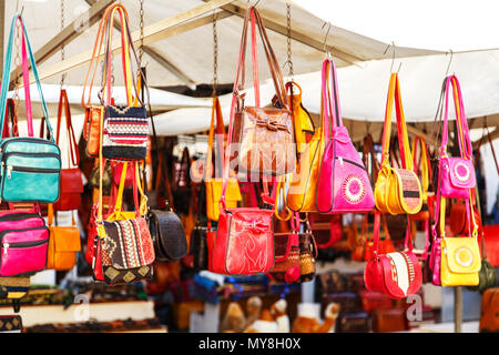 Leather and textile bags in tunisian market, Sidi Bou Said, Tunisia. Stock Photo