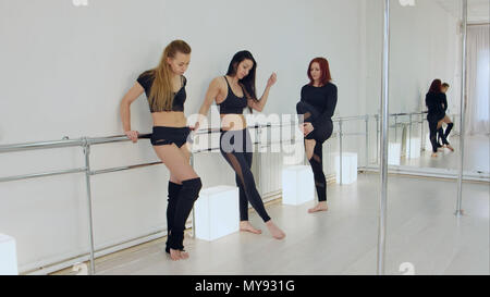Dancers resting in studio Stock Photo