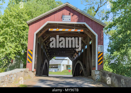 Leola, PA, USA - June 5, 2018: Zook’s Mill Covered Bridge, built in 1849 in Lancaster County, was featured in the 1978 film The Boys from Brazil. Stock Photo