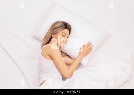 Young woman sleeping peacefully Stock Photo