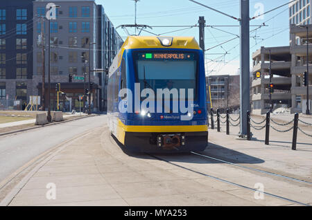 Minneapolis, Minnesota, USA – APRIL 22, 2018: Light rail commuter train along green line transit corridor in Prospect Park neighborhood of Minneapolis Stock Photo