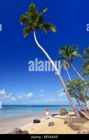 Woman on the Playa bonita  beach on the Samana peninsula in Dominican Republic near the Las Terrenas town Stock Photo