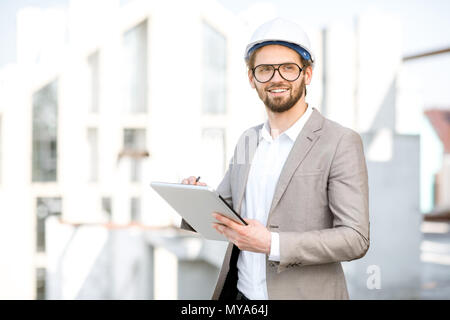 Engineer with tablet on the structure Stock Photo