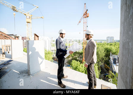 Engineers working on the structure Stock Photo