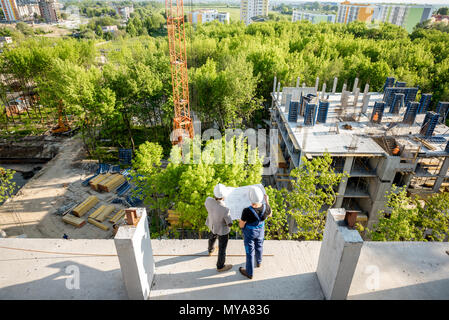 Construction site with workers Stock Photo