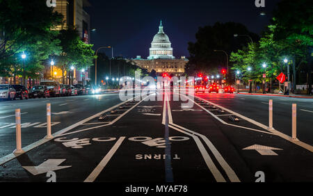 Bike lanes on Pennsylvania Avenue and the United States Capitol at night, in Washington, DC. Stock Photo