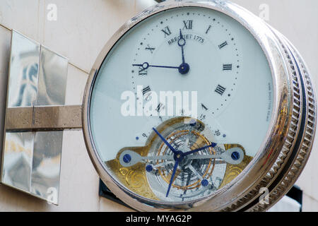 Vienna, Austria - October 22, 2017: Advertising sign in the form of clock Breguet on the wall of the store Stock Photo