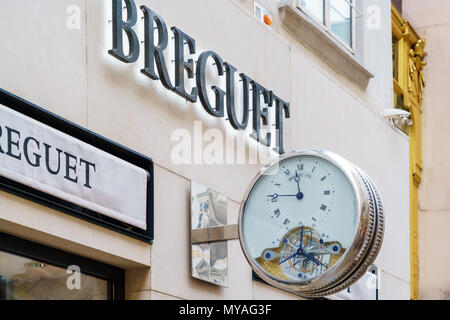 Vienna, Austria - October 22, 2017: Advertising sign in the form of clock Breguet on the wall of the store Stock Photo