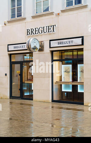 Vienna, Austria - October 22, 2017: Advertising sign in the form of clock Breguet on the wall of the store Stock Photo