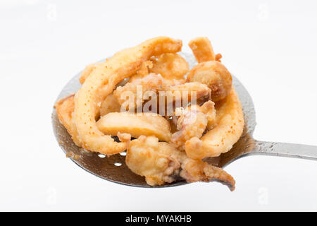 Deep fried cuttlefish made with a cuttlefish, Sepia officinalis, caught in the English Channel off the Dorset Coast. It has been cut into strips, coat Stock Photo