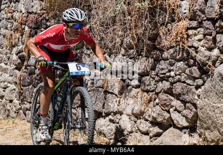 Turkish cyclist competes in an international mountain bike race in the Greek village of Molyvos on the island of Lesvos Stock Photo