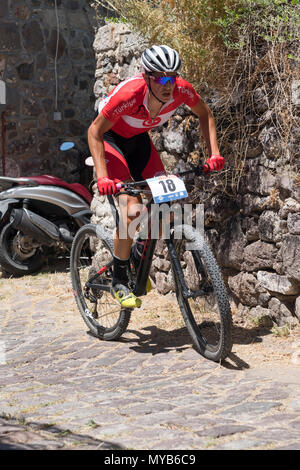 Turkish cyclist competes in an international mountain bike race in the Greek village of Molyvos on the island of Lesvos Stock Photo