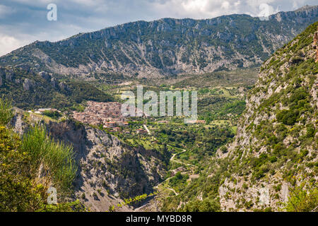 Town of Civita near Gole del Raganello (Raganello Canyon), Pollino Massif in distance, Southern Apennines, Pollino National Park, Calabria, Italy Stock Photo