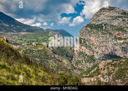 Gole del Raganello (Raganello Canyon), town of Civita on left, Pollino Massif in distance, Southern Apennines, Pollino National Park, Calabria, Italy Stock Photo