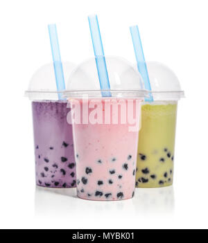 Various Bubble Tea in a plastic cups with drink straws isolated on white background. Take away drinks concept. Stock Photo