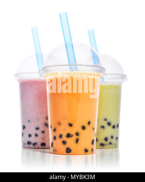 Various Bubble Tea in a plastic cups with drink straws isolated on white background. Take away drinks concept. Stock Photo