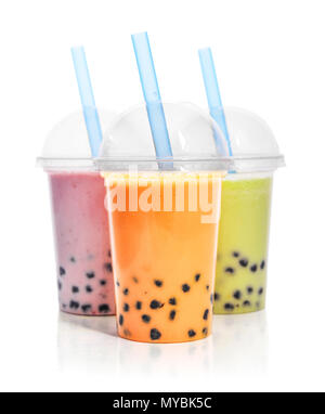 Various Bubble Tea in a plastic cups with drink straws isolated on white background. Take away drinks concept. Stock Photo