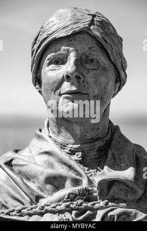 Statue of The Nairn Fishwife in the harbour at Nairn, Moray Firth, Highland, Scotland, UK Stock Photo