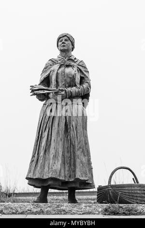 Statue of The Nairn Fishwife in the harbour at Nairn, Moray Firth, Highland, Scotland, UK Stock Photo