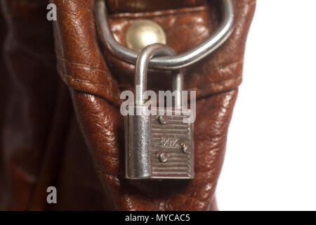 Brown leather bag with metal lock isolated on a white background Stock Photo
