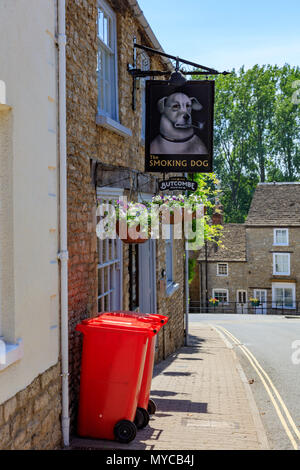 The Smoking Dog on the High Street In Malmesbury. Situated on a hill it is an attractive historic pub. Wiltshire, UK Stock Photo
