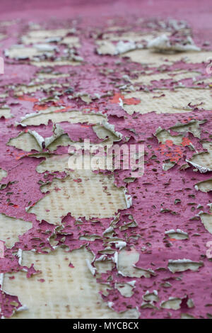 Macro of peeling painted surface of fibreglass structure. Metaphor hidden problems, under the surface, out of sight. Good abstract old paint texture Stock Photo