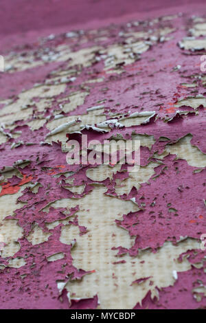 Macro of peeling painted surface of fibreglass structure. Metaphor hidden problems, under the surface, out of sight. Good abstract old paint texture Stock Photo