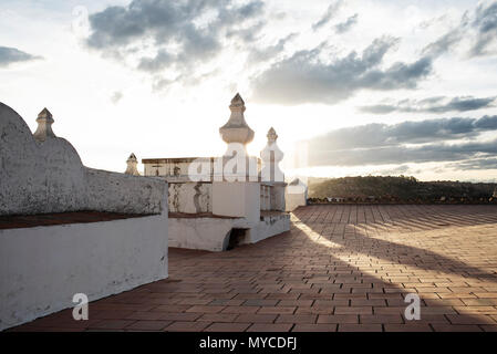 Sunset over San Felipe Neri, a neoclassical style church (originally a monastery) and its brick-floored rooftop. Sucre, Bolivia Stock Photo