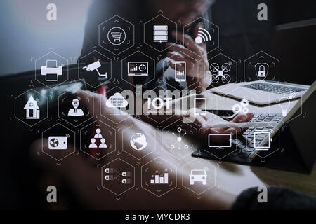 Internet of Things (IOT) technology with AR (Augmented Reality) on VR dashboard. StartUp Programming Team. Website designer working digital tablet doc Stock Photo