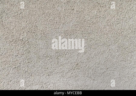 Abstract background of white wall with texture of decorative relief plaster. Stock Photo