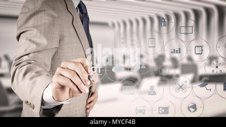 Internet of Things (IOT) technology with AR (Augmented Reality) on VR dashboard. businessman hand writing in the whiteboard or virtual screen Stock Photo