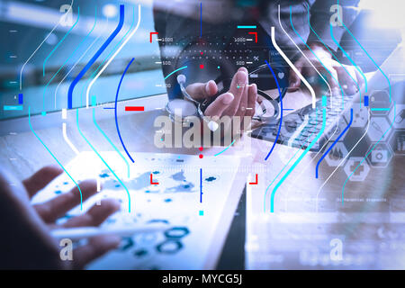 Health care and medical services with circular AR diagram record.Medical technology network team meeting concept. Doctor hand working smart phone mode Stock Photo