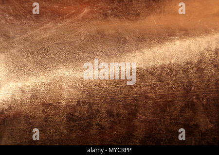 Scratched texture copper plating background close-up Stock Photo