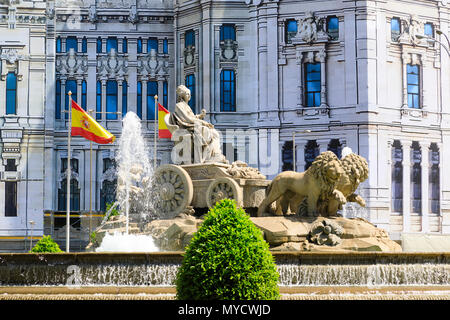 Palacio de Cibeles and fountain covered in painted scaffolding sheets. Madrid, Spain. May 2018 Stock Photo