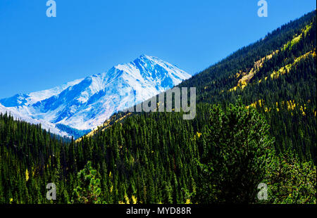 Snow - capped Mountain Peak in the Colorado Rocky Mountains near Denver Stock Photo