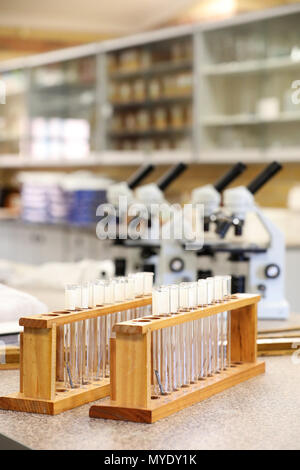 science scientist related images displaying electronic microscopes and test tubes in a laboratory or storeroom. strong education research and medical Stock Photo