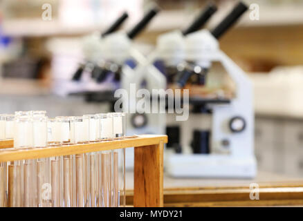 science scientist related images displaying electronic microscopes and test tubes in a laboratory or storeroom. strong education research and medical Stock Photo