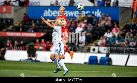 Swansea, UK. 7th Jun, 2018. Wales v Bosnia Womens International World Cup Qualifier, Liberty Stadium, Swansea,7/6/18: Jess Fishlock wins the header for Wales Credit: Andrew Dowling/Influential Photography/Alamy Live News Stock Photo