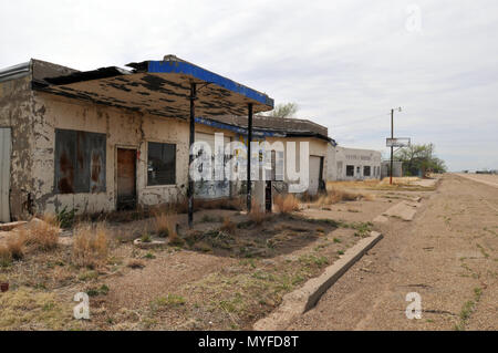 Abandoned businesses, including a gas station, stand along old Route 66 in San Jon, New Mexico. Interstate 40 bypassed the village in 1981. Stock Photo