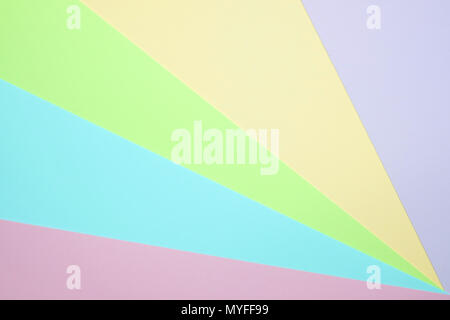 Fashionable  pastel colored paper flat lay top view, geometric background texture, pink, purple, yellow, beige, green and blue colour. Stock Photo