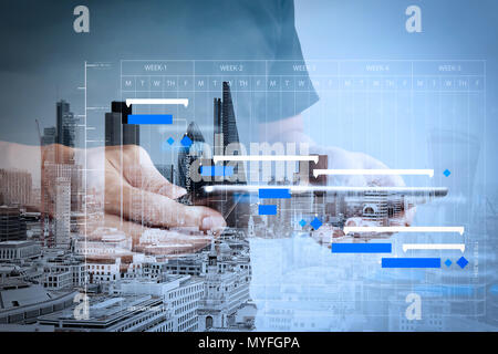Project manager working and update tasks with milestones progress planning and Gantt chart scheduling diagram.success businessman using digital tablet Stock Photo