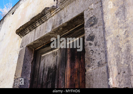 Stone Lintel Above Rustic Wooden Door Stock Photo