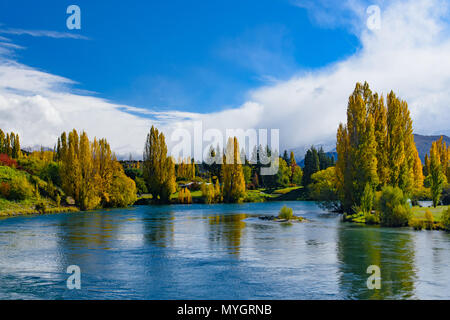 Trees around lake in autumn, South Island, New Zealand Stock Photo