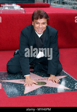 Juan Gabriel, one of the Mexico most succesfull vocalists was inducted on the Hollywood Walk of Fame in Los Angeles. His star is at 7060 Hollywood Blvd. May, 10, 2002.            -            JuanGabriel StarHollywood05.jpgJuanGabriel StarHollywood05  Event in Hollywood Life - California, Red Carpet Event, USA, Film Industry, Celebrities, Photography, Bestof, Arts Culture and Entertainment, Topix Celebrities fashion, Best of, Hollywood Life, Event in Hollywood Life - California, movie celebrities, TV celebrities, Music celebrities, Topix, Bestof, Arts Culture and Entertainment, Photography,    Stock Photo