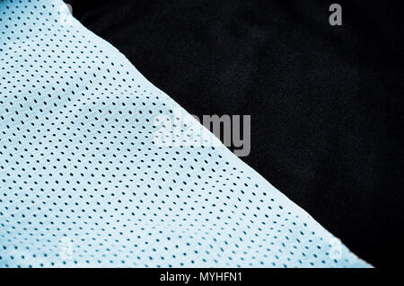 Close up of light blue polyester nylon sportswear shorts to created a textured background Stock Photo