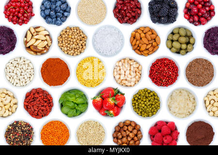 Collection of fruits berries vegetables nuts background from above isolated on a white background Stock Photo