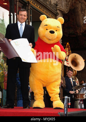 For his 80th Anniversary, Winnie The Pooh ( with Robert Iger, president and CEO of Disney) was honored with a star on the Hollywood Walk of Fame in Los Angeles. April 11 2006.          -            WinnieThePooh 010.jpgWinnieThePooh 010  Event in Hollywood Life - California, Red Carpet Event, USA, Film Industry, Celebrities, Photography, Bestof, Arts Culture and Entertainment, Topix Celebrities fashion, Best of, Hollywood Life, Event in Hollywood Life - California, movie celebrities, TV celebrities, Music celebrities, Topix, Bestof, Arts Culture and Entertainment, Photography,    inquiry tsuni Stock Photo